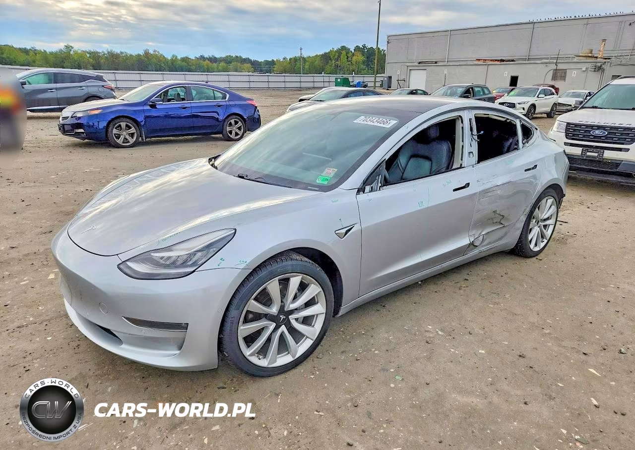 2018 Tesla Model 3 VIN:5YJ3E1EB1JF087666 - 1