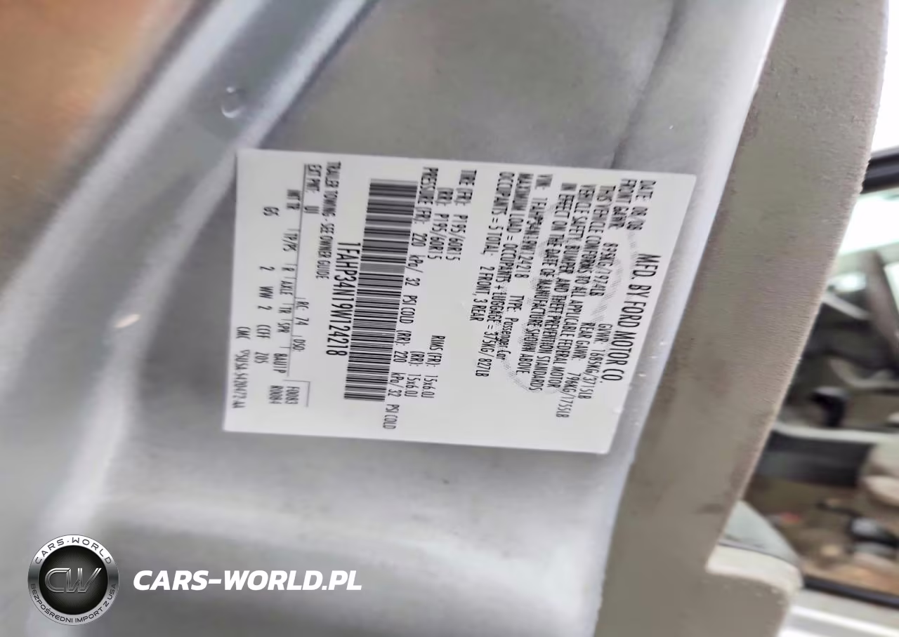 2009 Ford Focus S VIN:1FAHP34N19W124218 - 12
