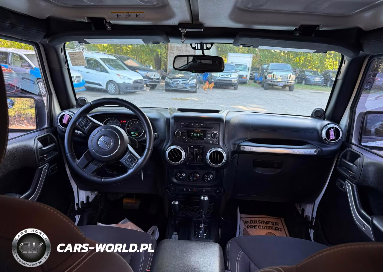 2014 Jeep Wrangler Unlimited Sahara VIN:1C4BJWEG5EL105525 - 9