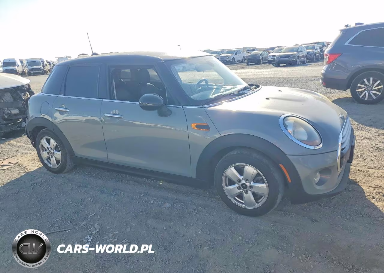 2015 Mini Cooper VIN:WMWXS5C58FT829402 - 4