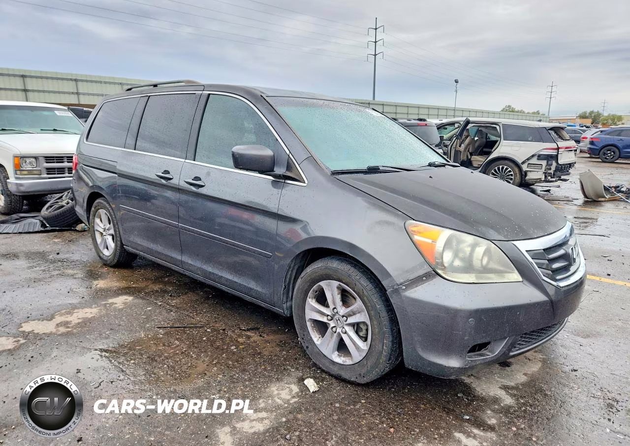 2010 Honda Odyssey Touring VIN:5FNRL3H94AB092641 - 4