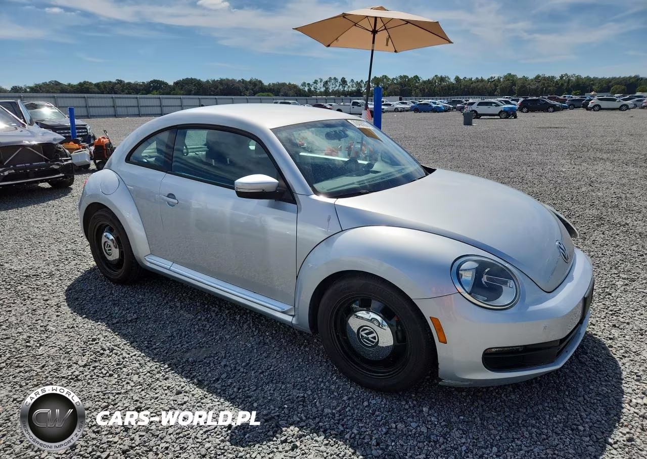 2014 Volkswagen Beetle VIN:3VWJX7AT3EM619629 - 4