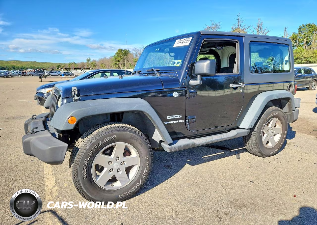 2012 Jeep Wrangler Sport VIN:1C4GJWAG4CL247325 - 1