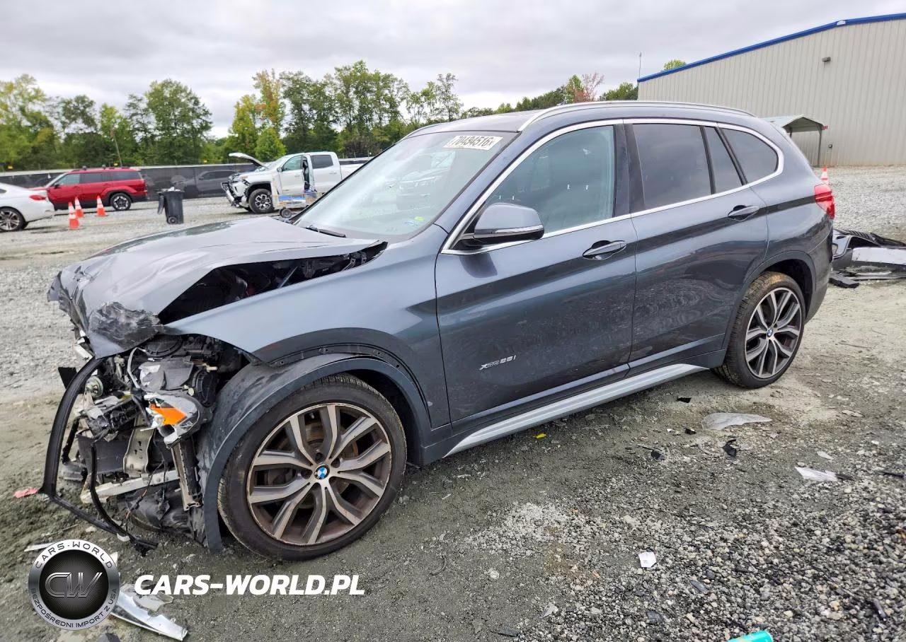 2018 BMW X1 xDrive28I VIN:WBXHT3C30J5K28704 - 1
