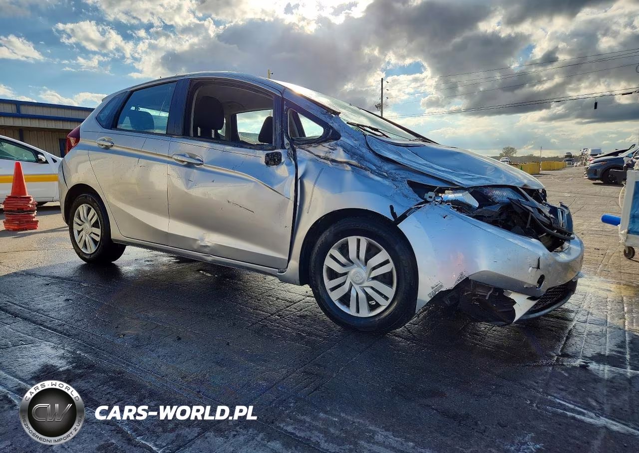 2015 Honda Fit Lx VIN:3HGGK5H54FM738056 - 4