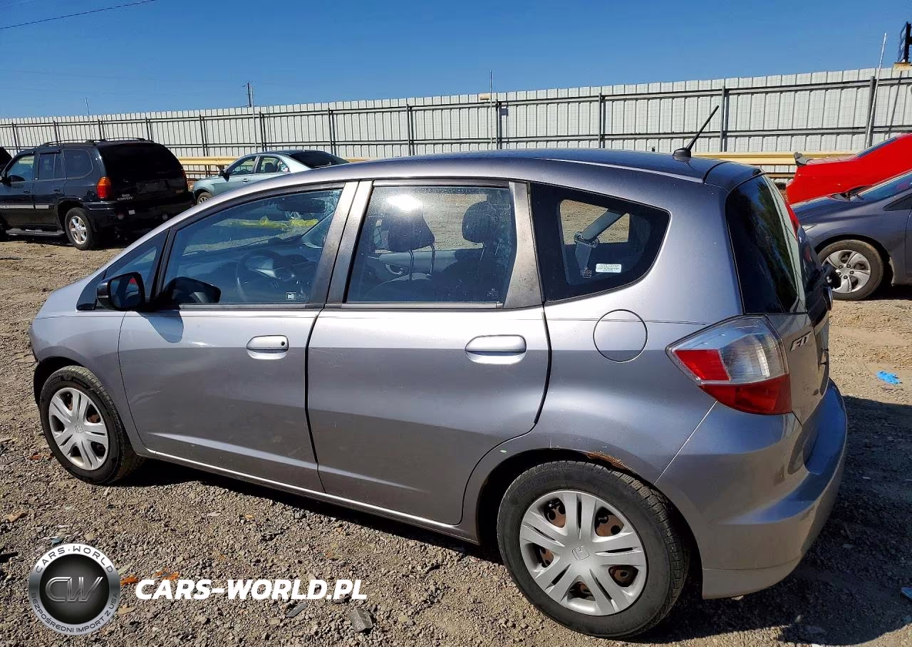 2009 Honda Fit VIN:JHMGE88279S025000 - 2