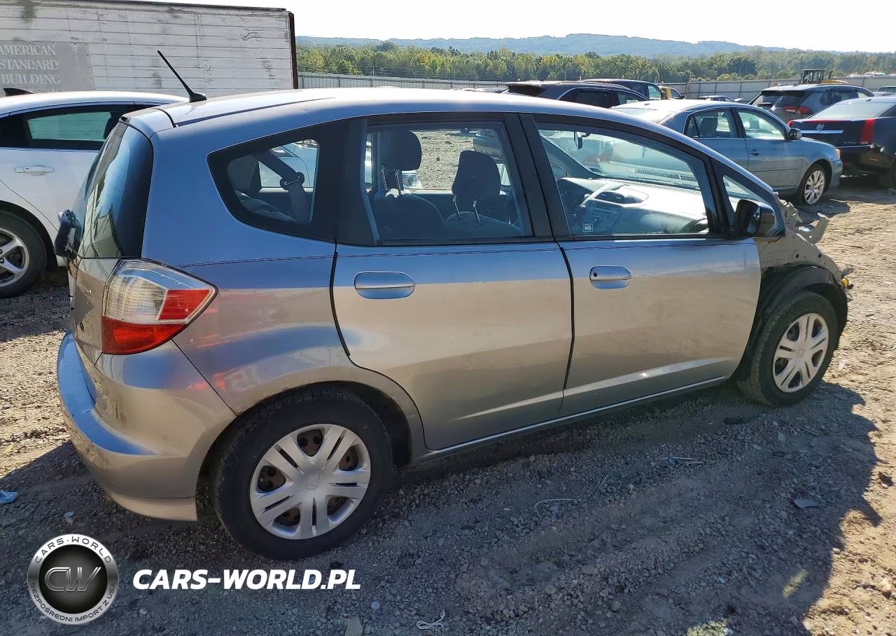 2009 Honda Fit VIN:JHMGE88279S025000 - 3