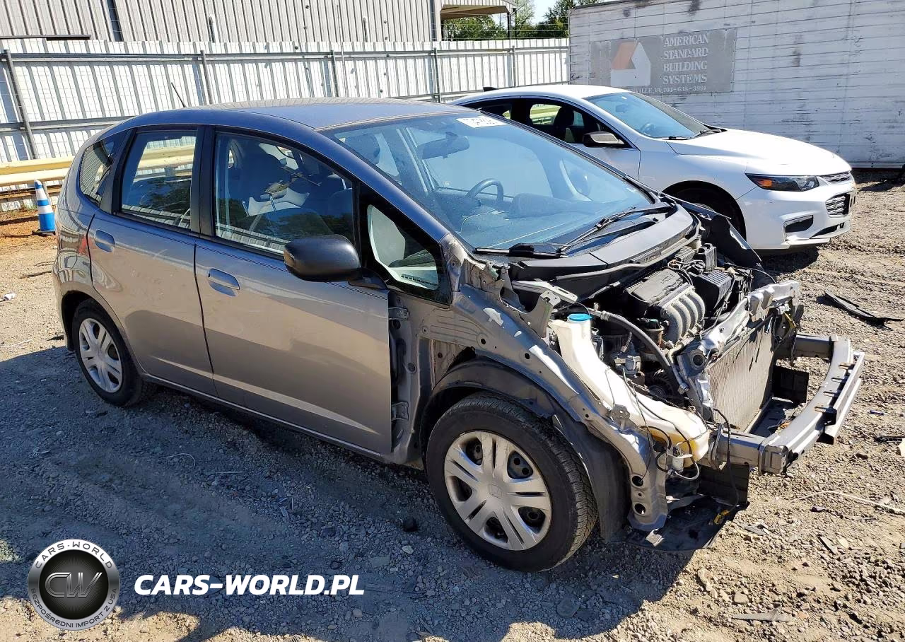 2009 Honda Fit VIN:JHMGE88279S025000 - 4