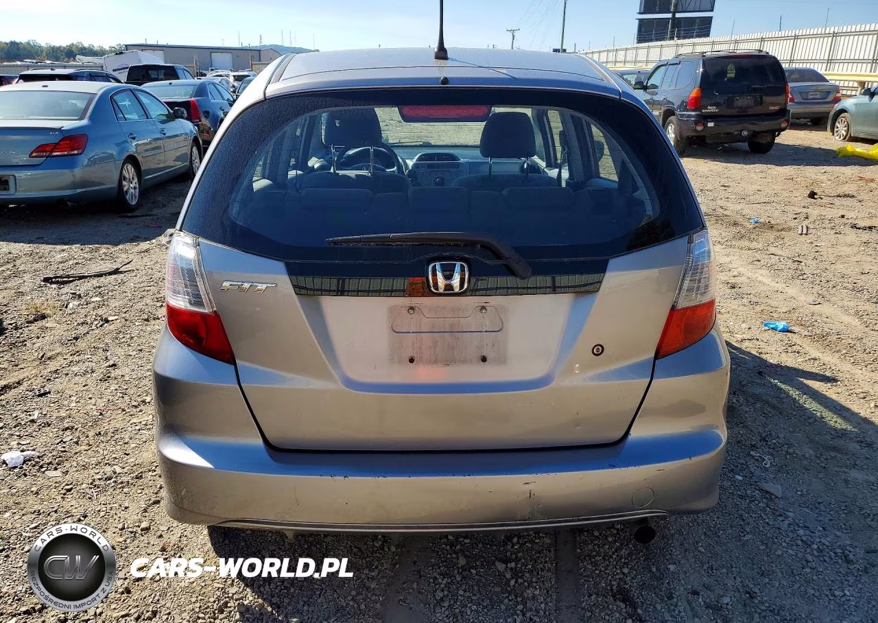 2009 Honda Fit VIN:JHMGE88279S025000 - 6