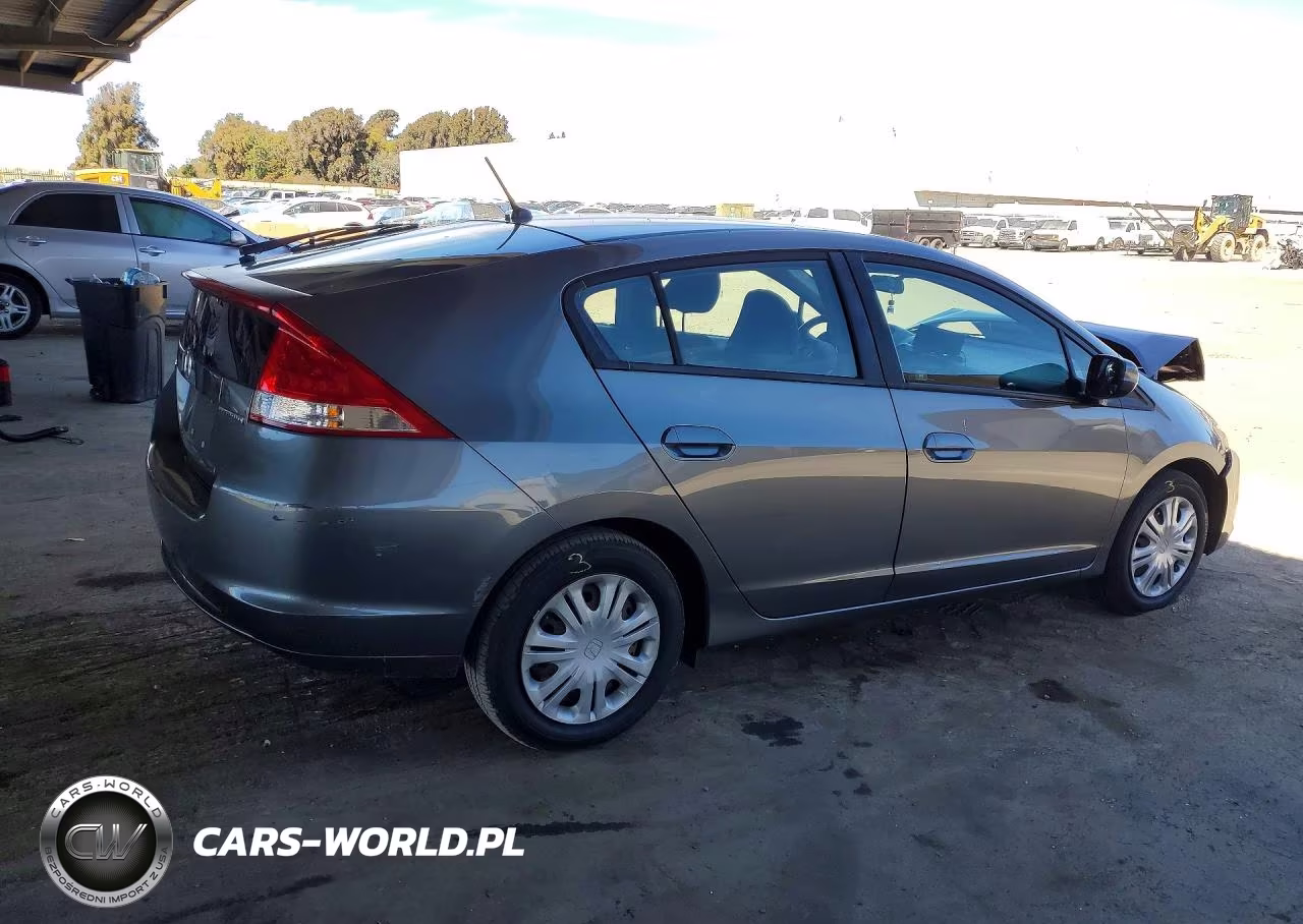 2010 Honda Insight Lx VIN:JHMZE2H57AS007715 - 3