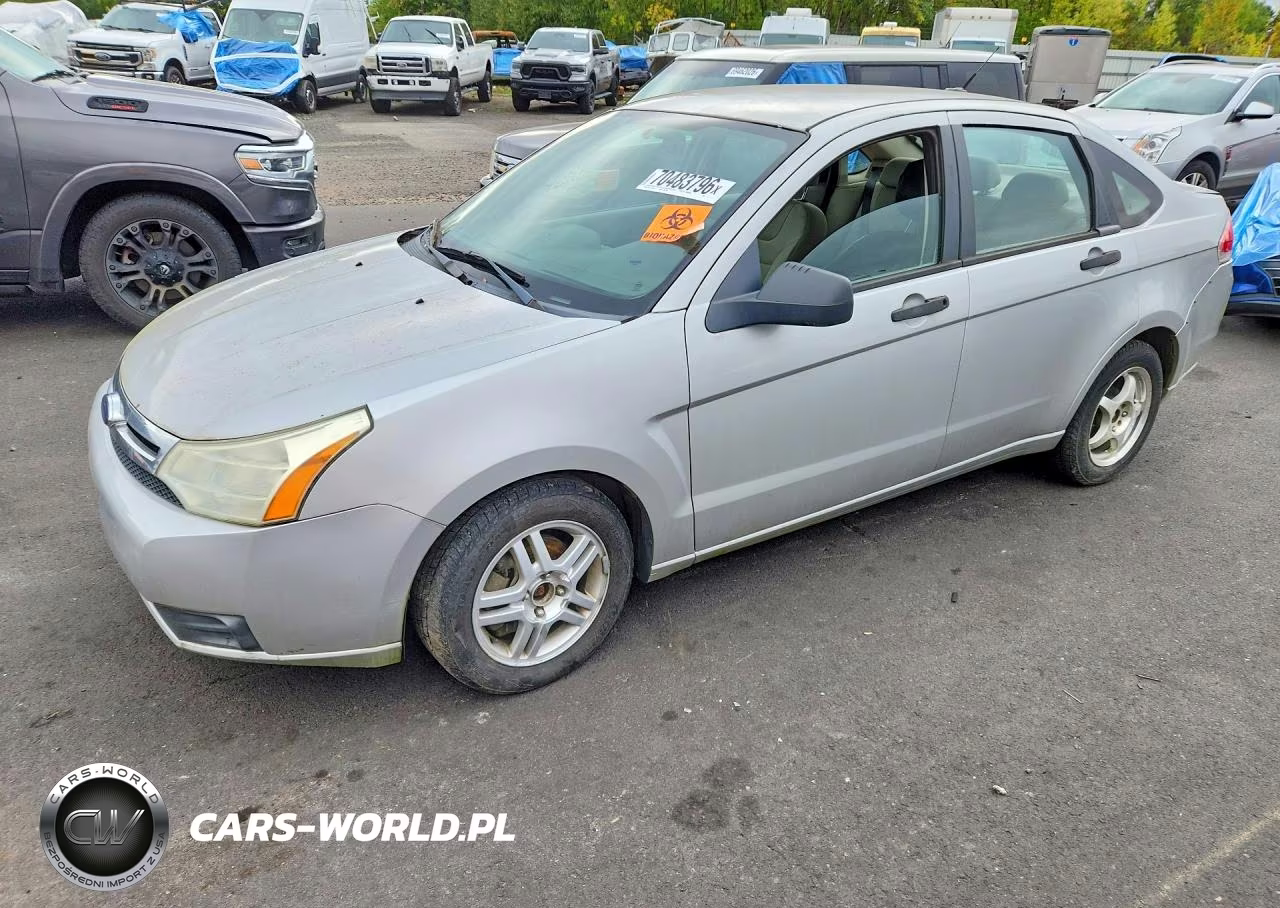 2009 Ford Focus VIN:1FAHP34N49W151588 - 1
