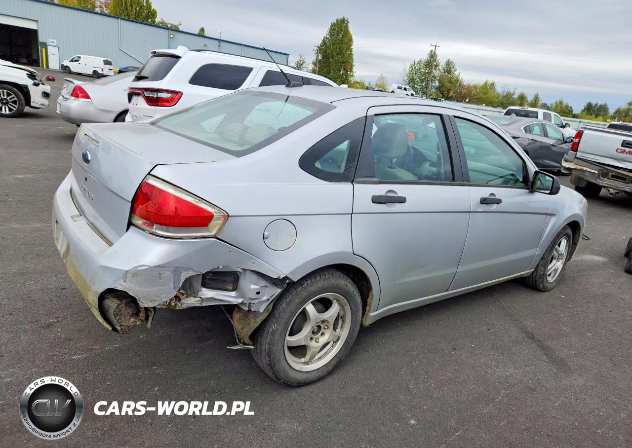 2009 Ford Focus VIN:1FAHP34N49W151588 - 3