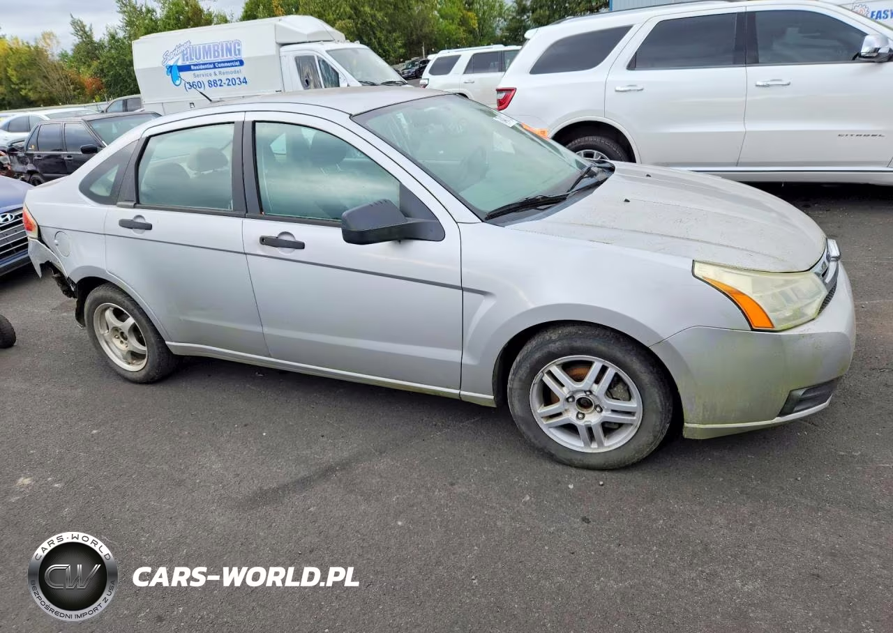 2009 Ford Focus VIN:1FAHP34N49W151588 - 4