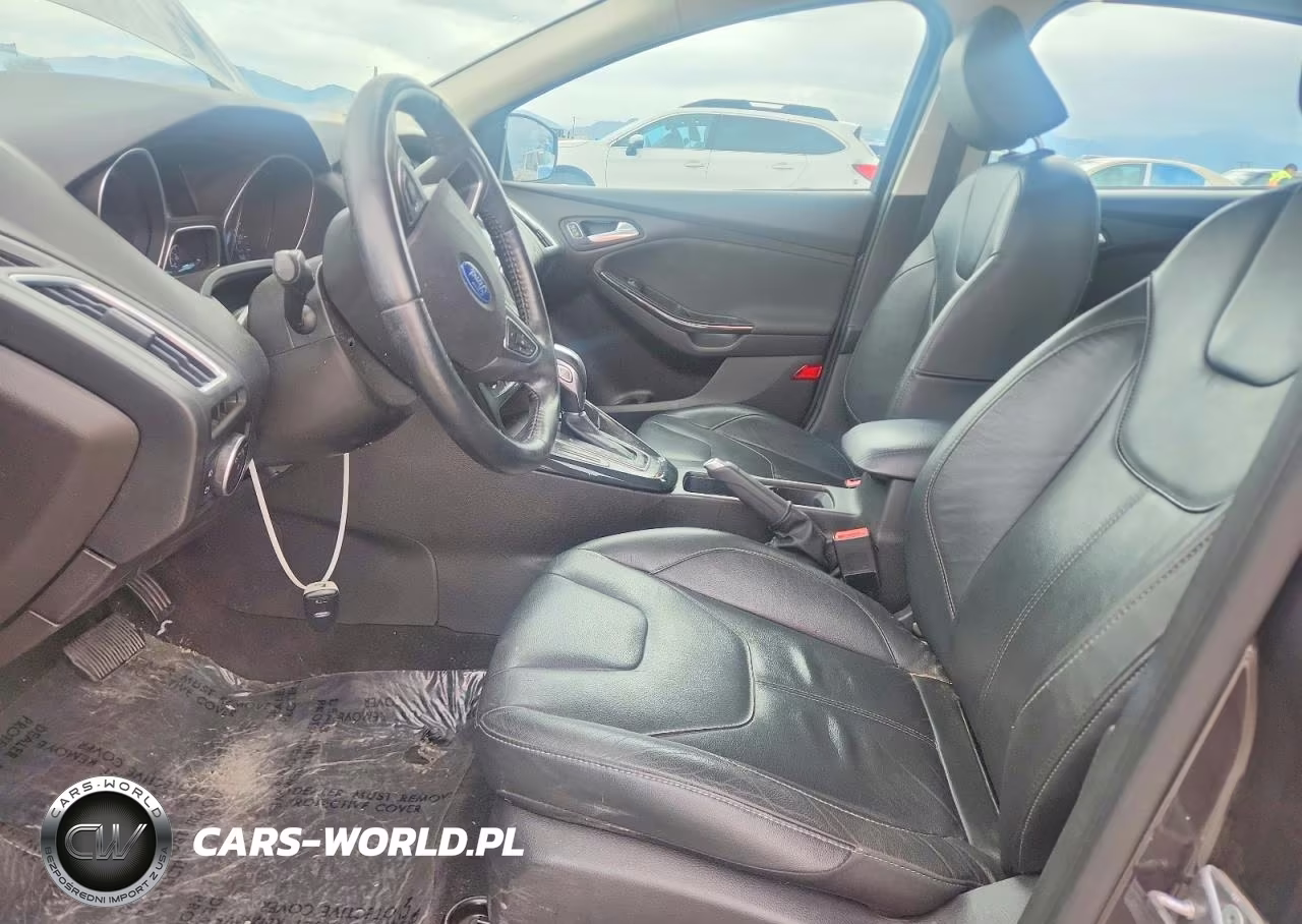 2016 Ford Focus Titanium VIN:1FADP3N21GL221520 - 7