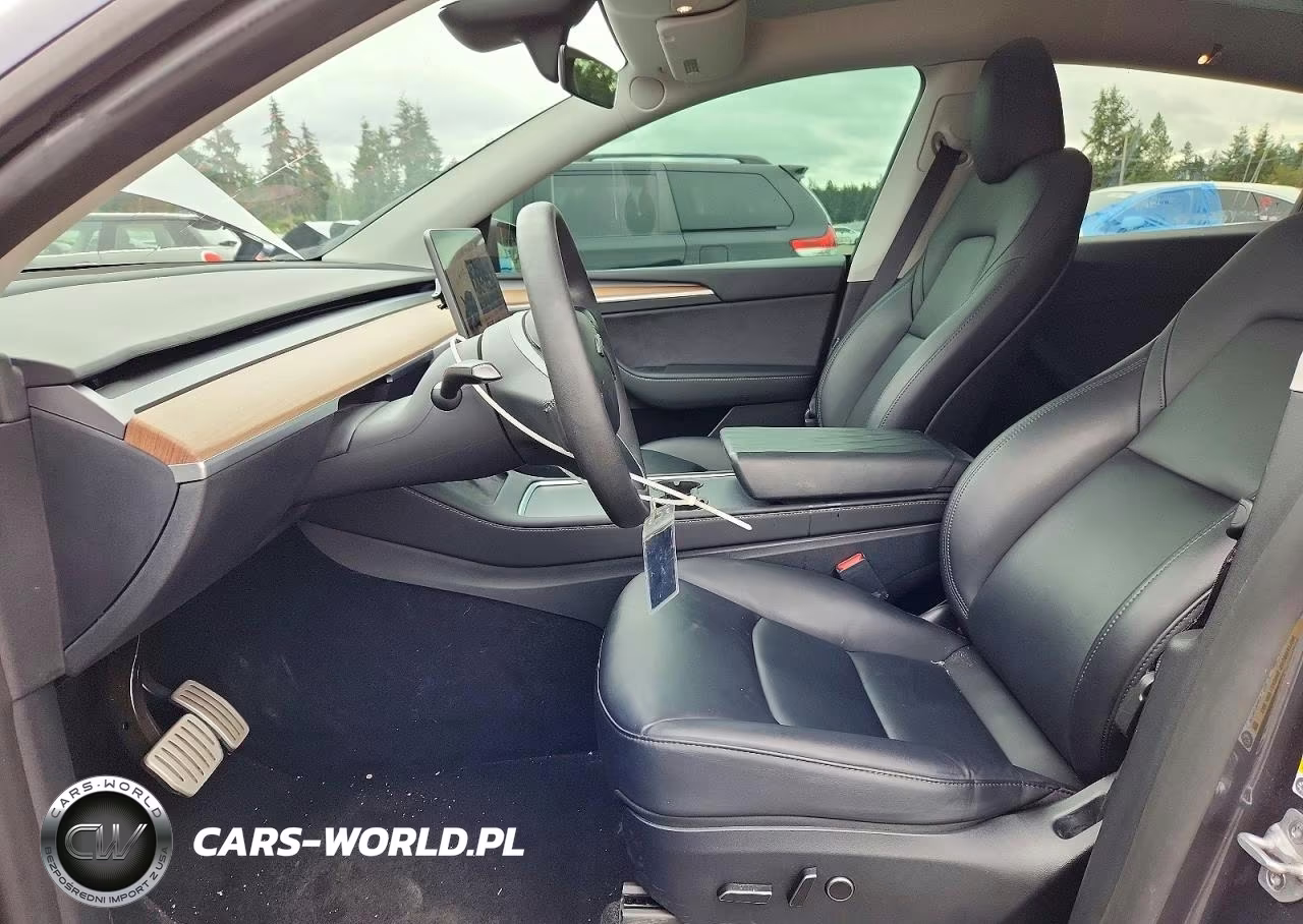 2023 Tesla Model Y VIN:7SAYGDEF0PF883194 - 7