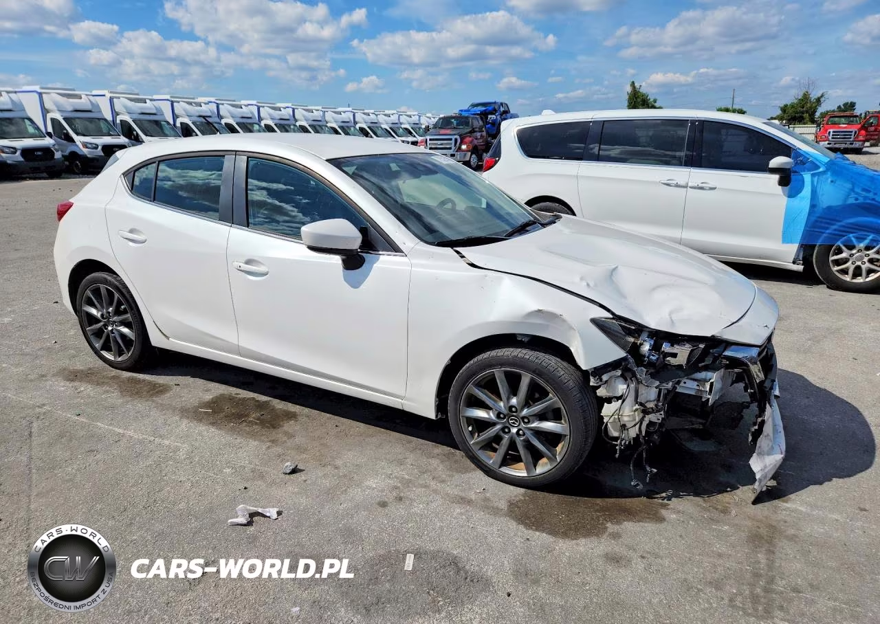 2018 Mazda 3 Touring VIN:3MZBN1L37JM271297 - 4