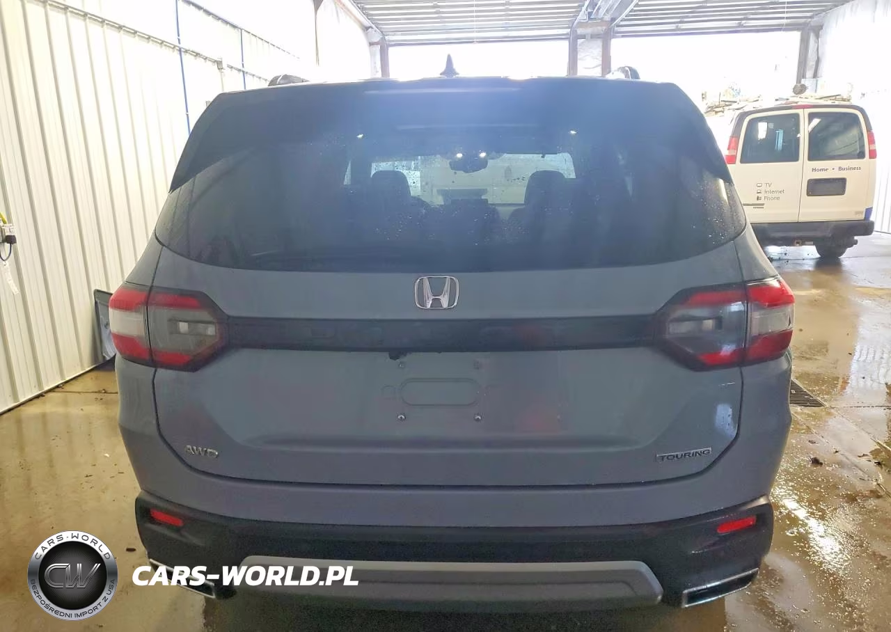 2023 Honda Pilot Touring VIN:5FNYG1H72PB048942 - 6