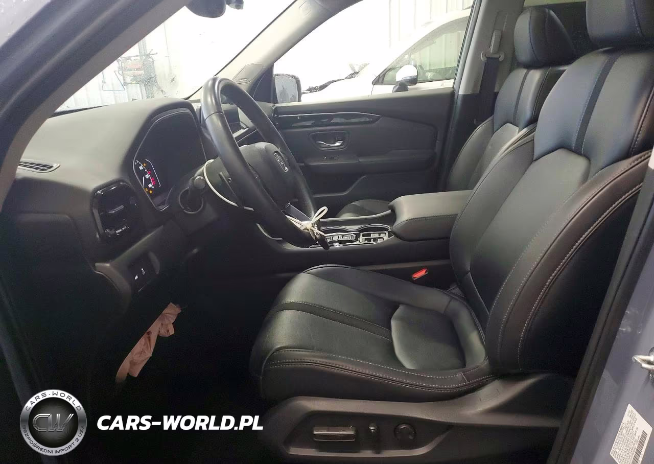 2023 Honda Pilot Touring VIN:5FNYG1H72PB048942 - 7