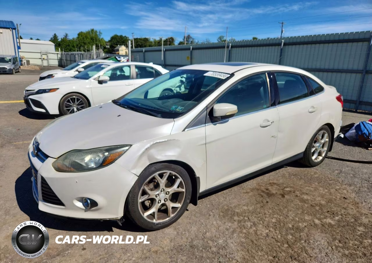 2013 Ford Focus Titanium VIN:1FADP3J28DL166985 - 1