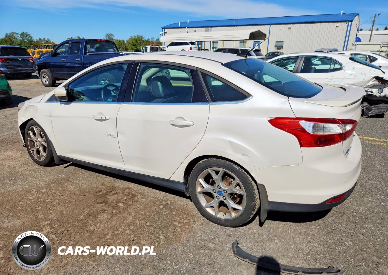 2013 Ford Focus Titanium VIN:1FADP3J28DL166985 - 2