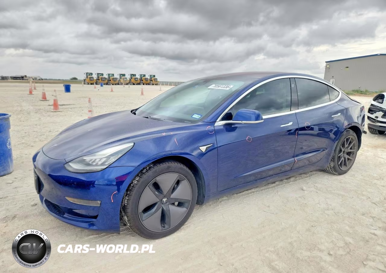 2018 Tesla Model 3 VIN:5YJ3E1EB9JF115164 - 1