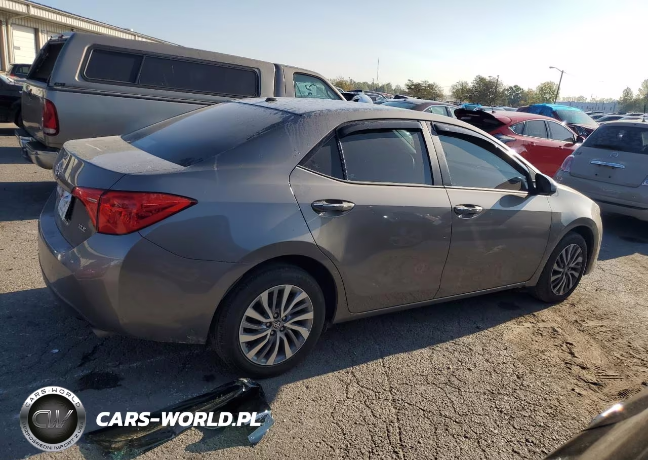 2018 Toyota Corolla L VIN:5YFBURHE0JP831605 - 3