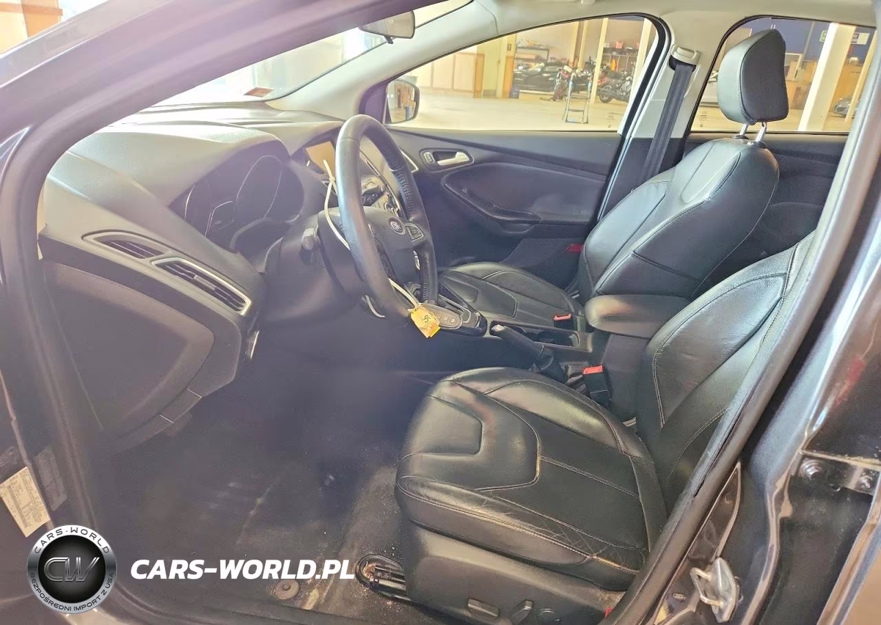 2016 Ford Focus Titanium VIN:1FADP3N20GL323424 - 7