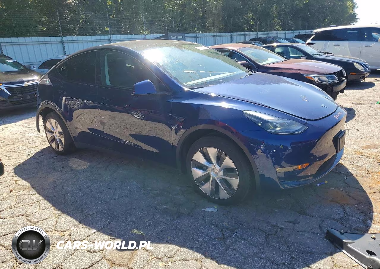 2023 Tesla Model Y VIN:7SAYGAEE4PF850902 - 4