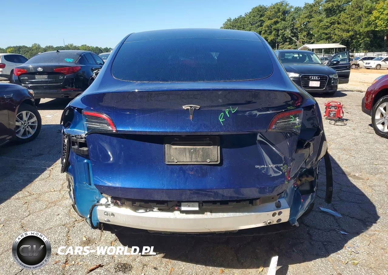 2023 Tesla Model Y VIN:7SAYGAEE4PF850902 - 6