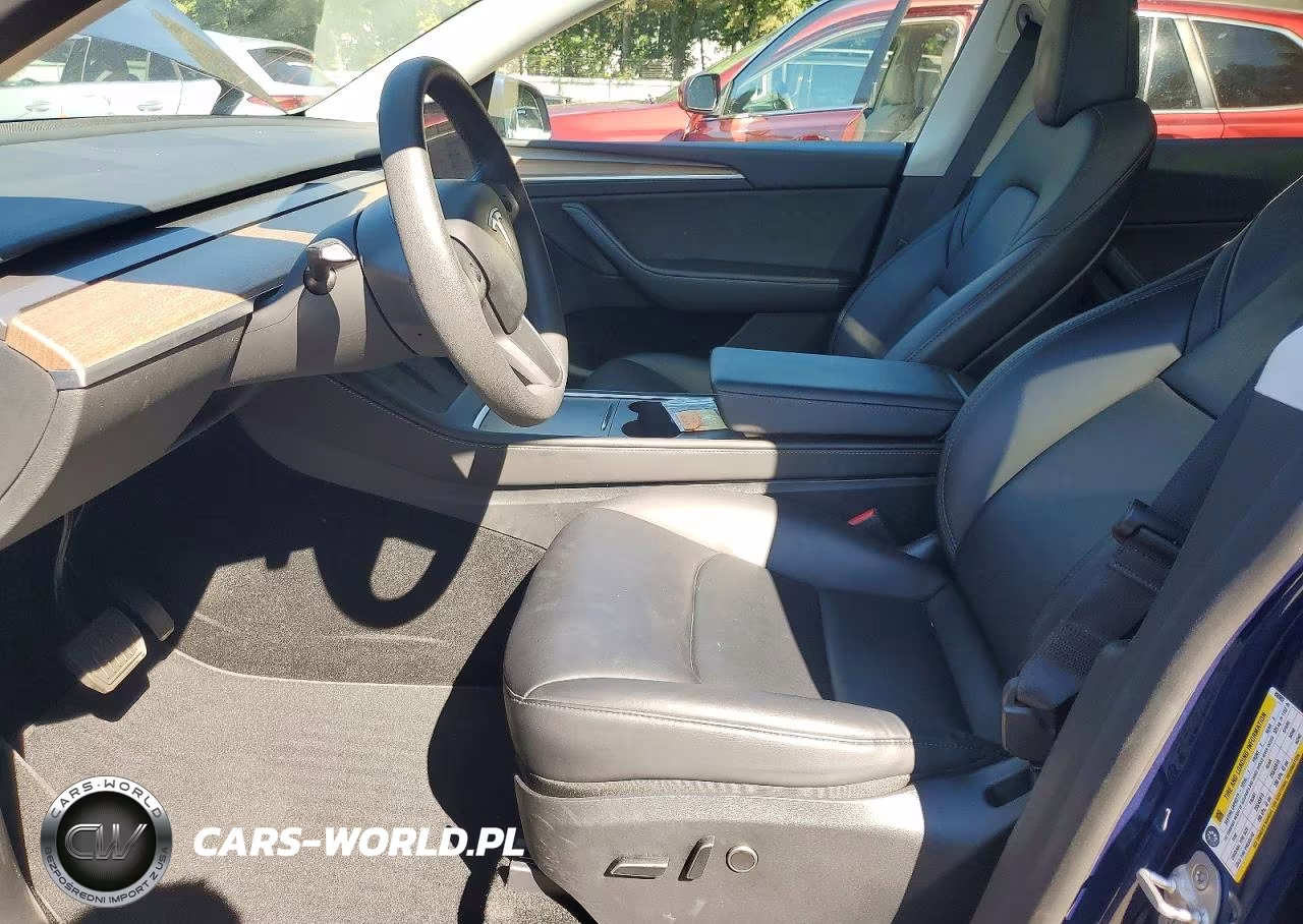 2023 Tesla Model Y VIN:7SAYGAEE4PF850902 - 7