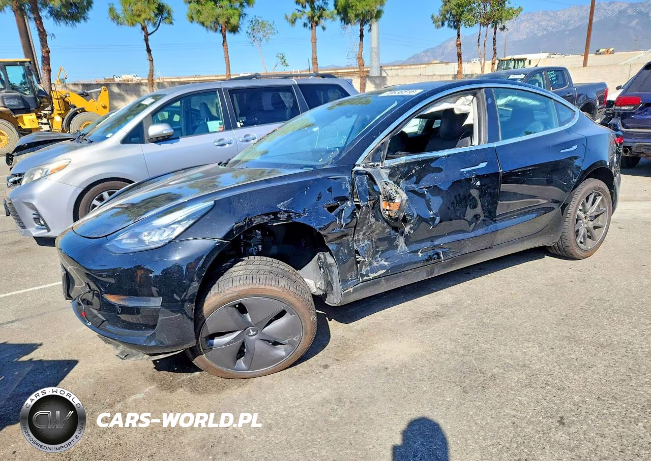 2019 Tesla Model 3 VIN:5YJ3E1EA8KF415772 - 1