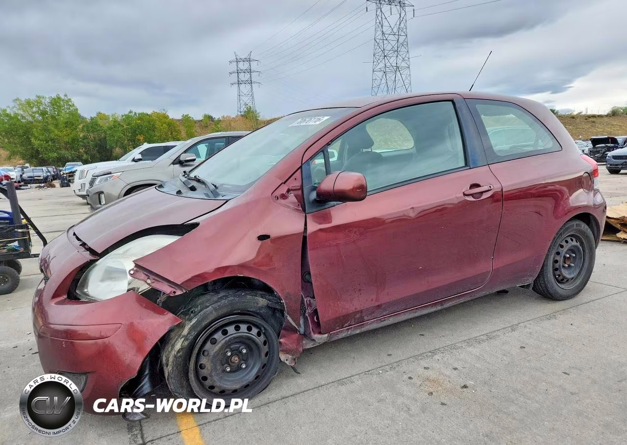 2009 Toyota Yaris Base VIN:JTDJT903X95248458 - 1