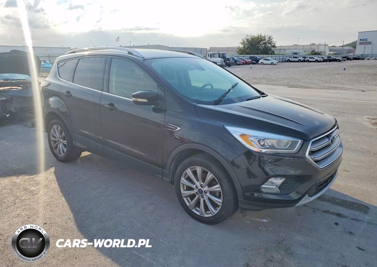 2017 Ford Escape Titanium VIN:1FMCU9JD8HUC89734 - 4