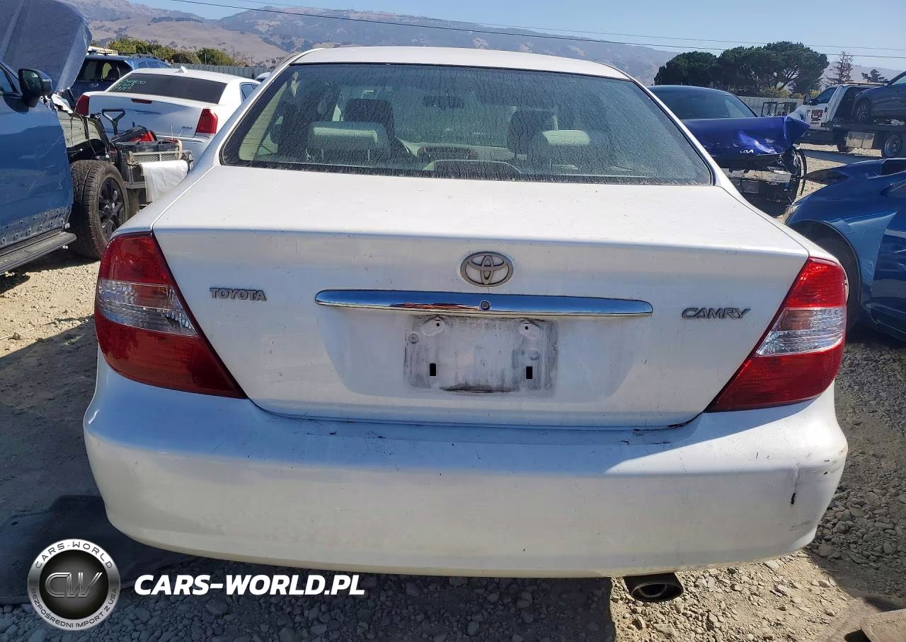 2004 Toyota Camry Le VIN:JTDBE30K140279770 - 6