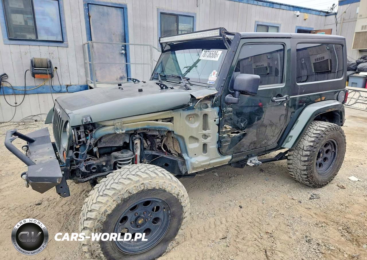 2011 Jeep Wrangler Sahara VIN:1J4GA5D15BL539298 - 1