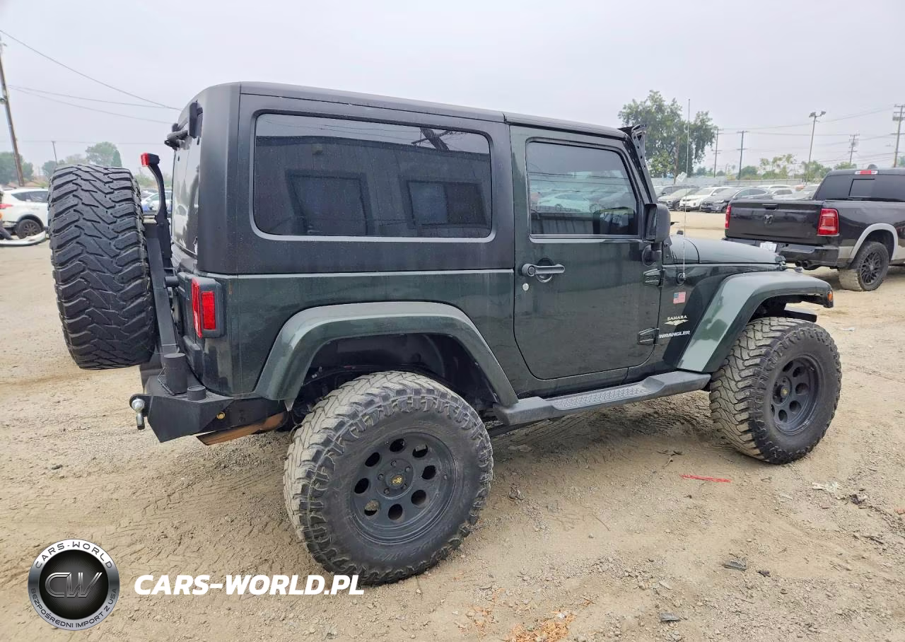 2011 Jeep Wrangler Sahara VIN:1J4GA5D15BL539298 - 3