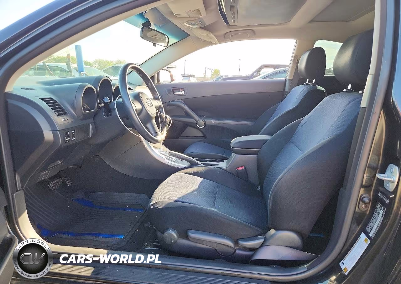 2005 Scion Tc Base VIN:JTKDE177050023208 - 7