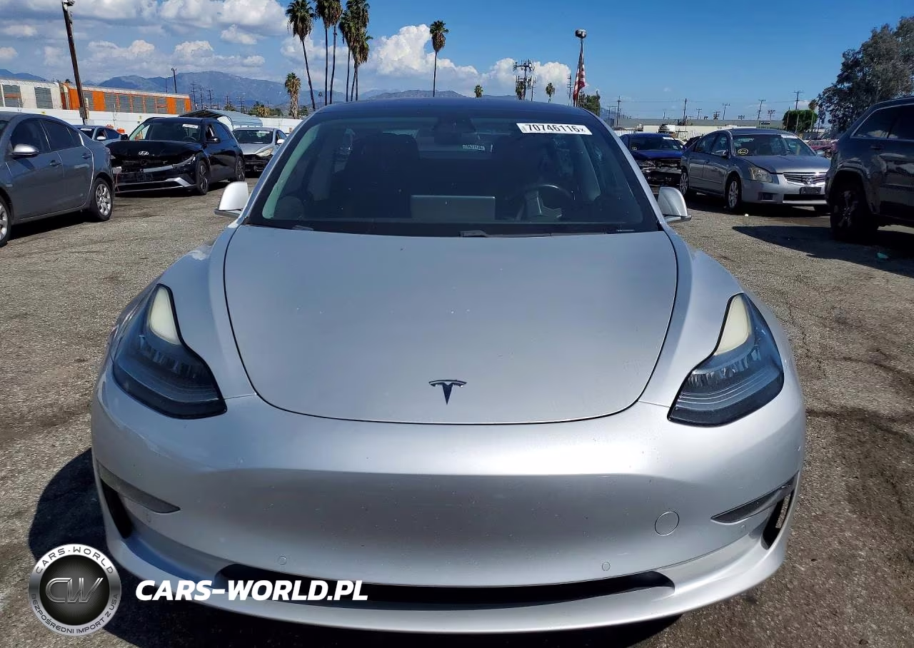 2018 Tesla Model 3 VIN:5YJ3E1EAXJF011001 - 5