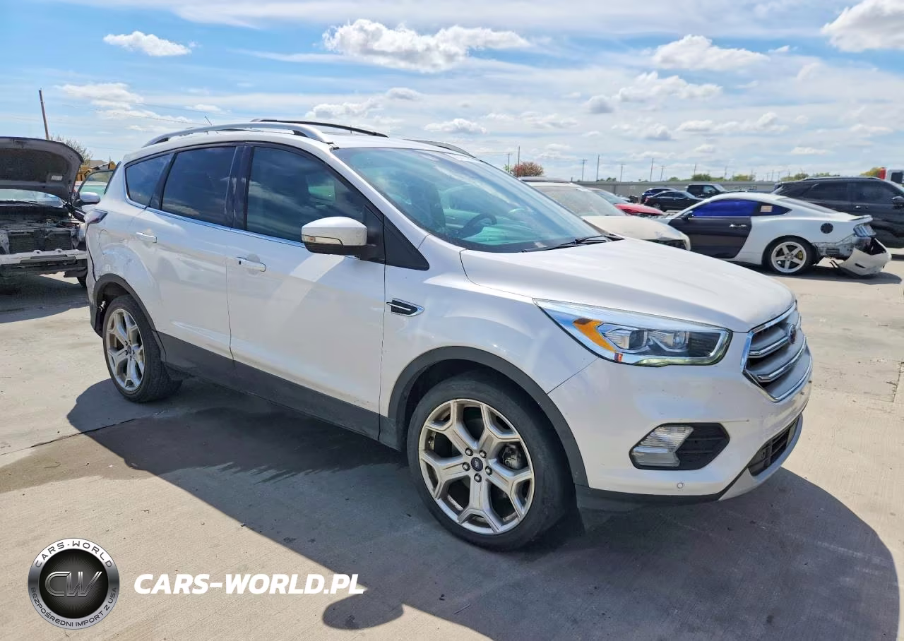 2017 Ford Escape Titanium VIN:1FMCU0J93HUB35570 - 4