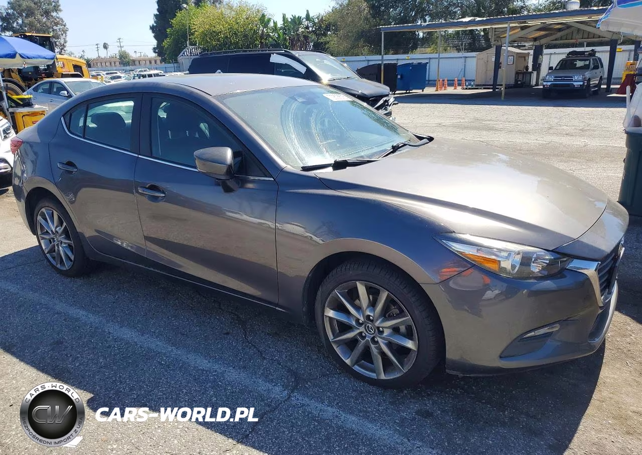 2018 Mazda 3 Touring VIN:3MZBN1V31JM204899 - 4