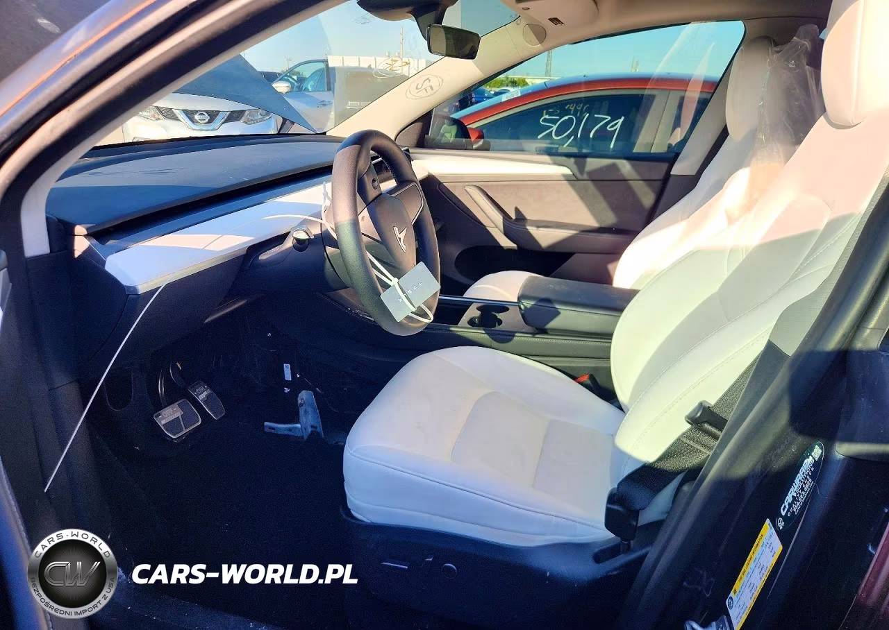 2023 Tesla Model Y VIN:7SAYGDEE1PF885169 - 7