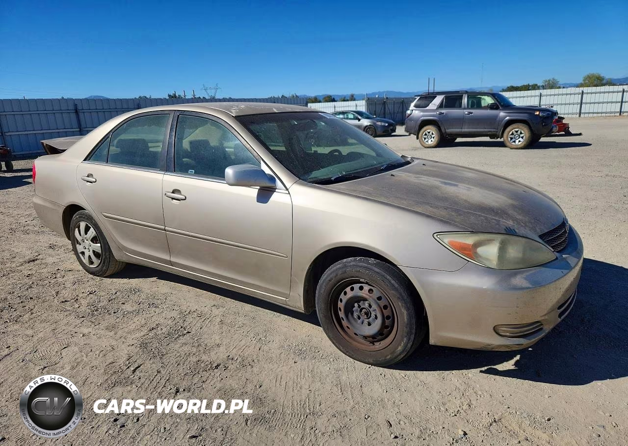 2003 Toyota Camry Le VIN:JTDBE32K930169299 - 4