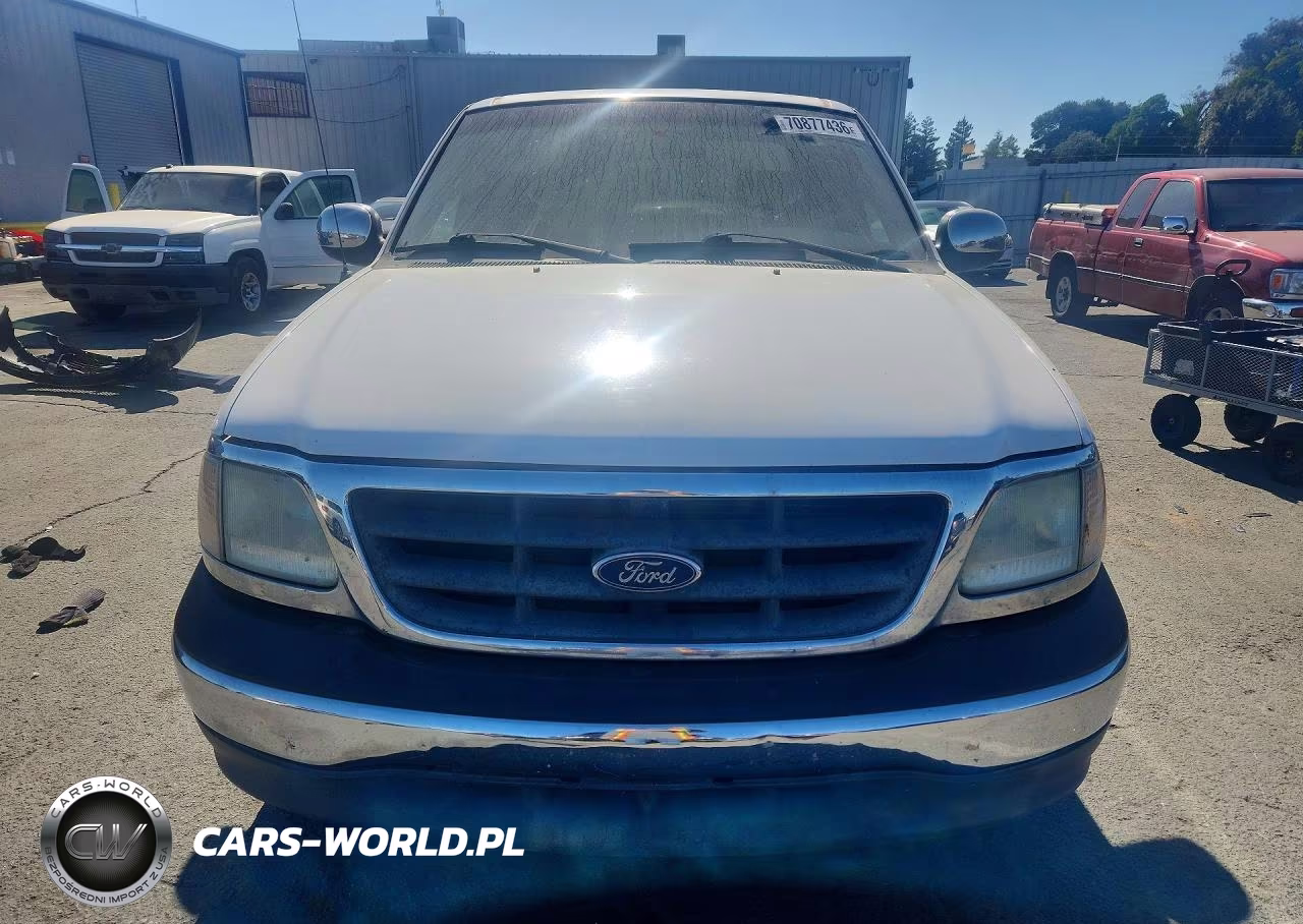 2002 Ford F150 VIN:1FTRX17L42NA70504 - 5