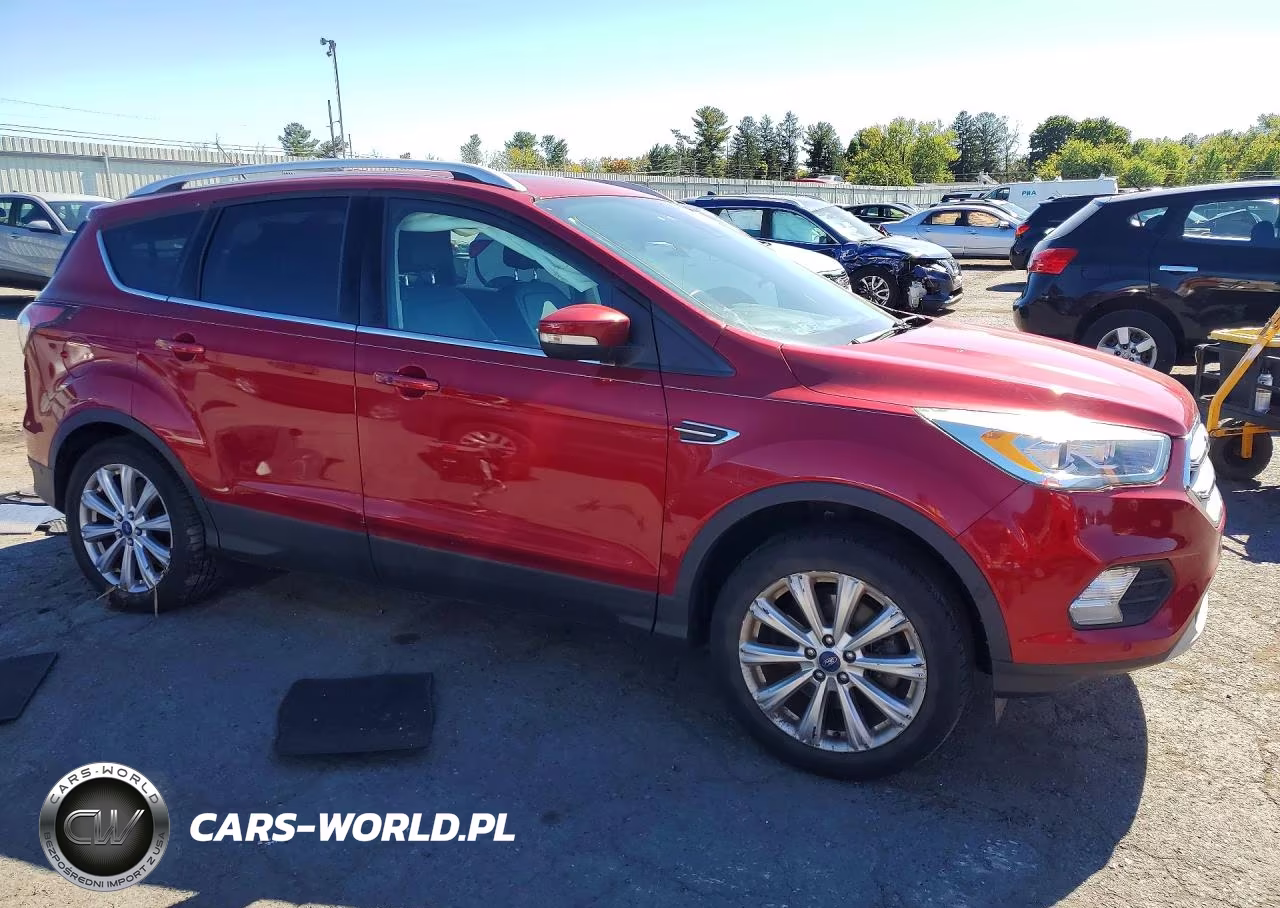 2017 Ford Escape Titanium VIN:1FMCU9JDXHUB12053 - 4