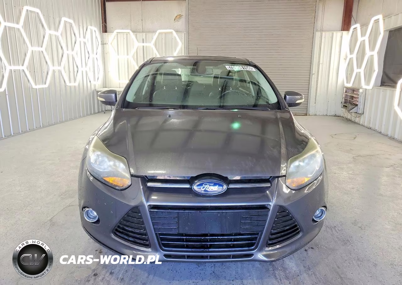 2012 Ford Focus Titanium VIN:1FAHP3N24CL327469 - 5