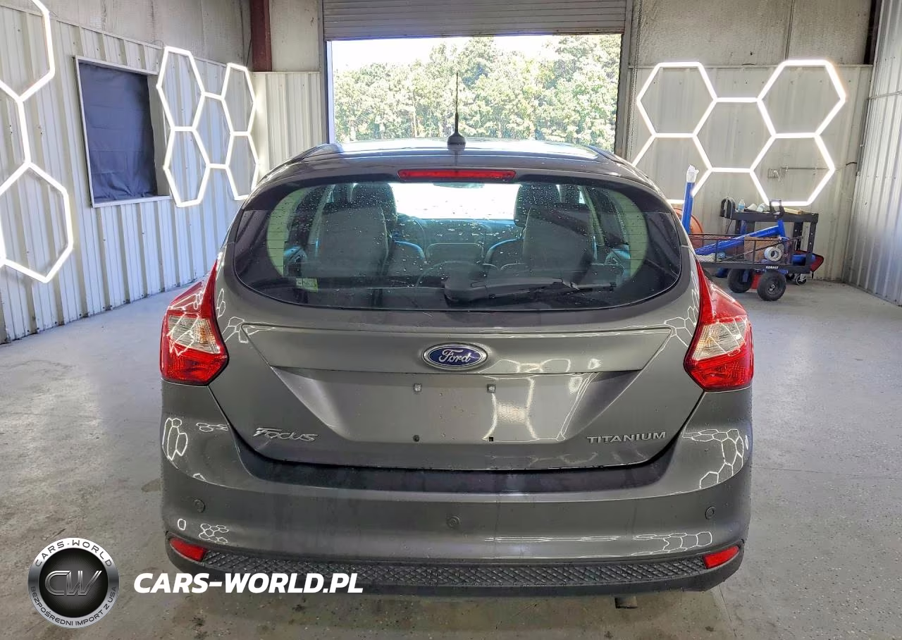 2012 Ford Focus Titanium VIN:1FAHP3N24CL327469 - 6