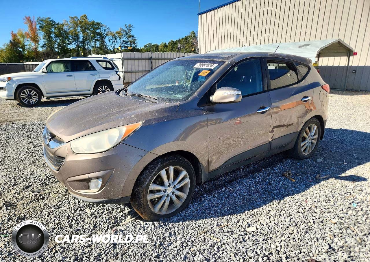 2011 Hyundai Tucson Limited VIN:KM8JUCAC6BU203887 - 1