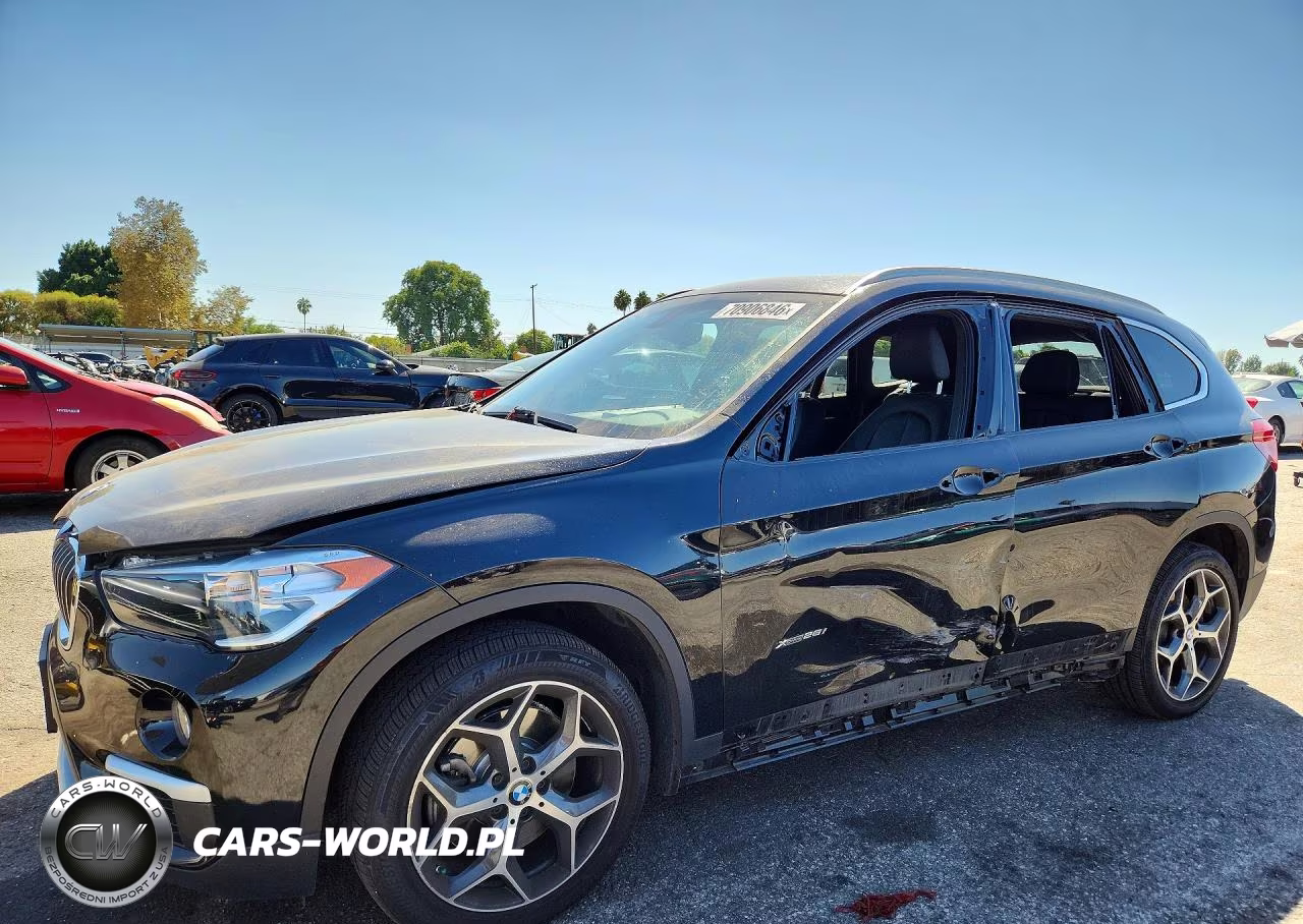 2018 BMW X1 xDrive28I VIN:WBXHT3C31J5K24662 - 1