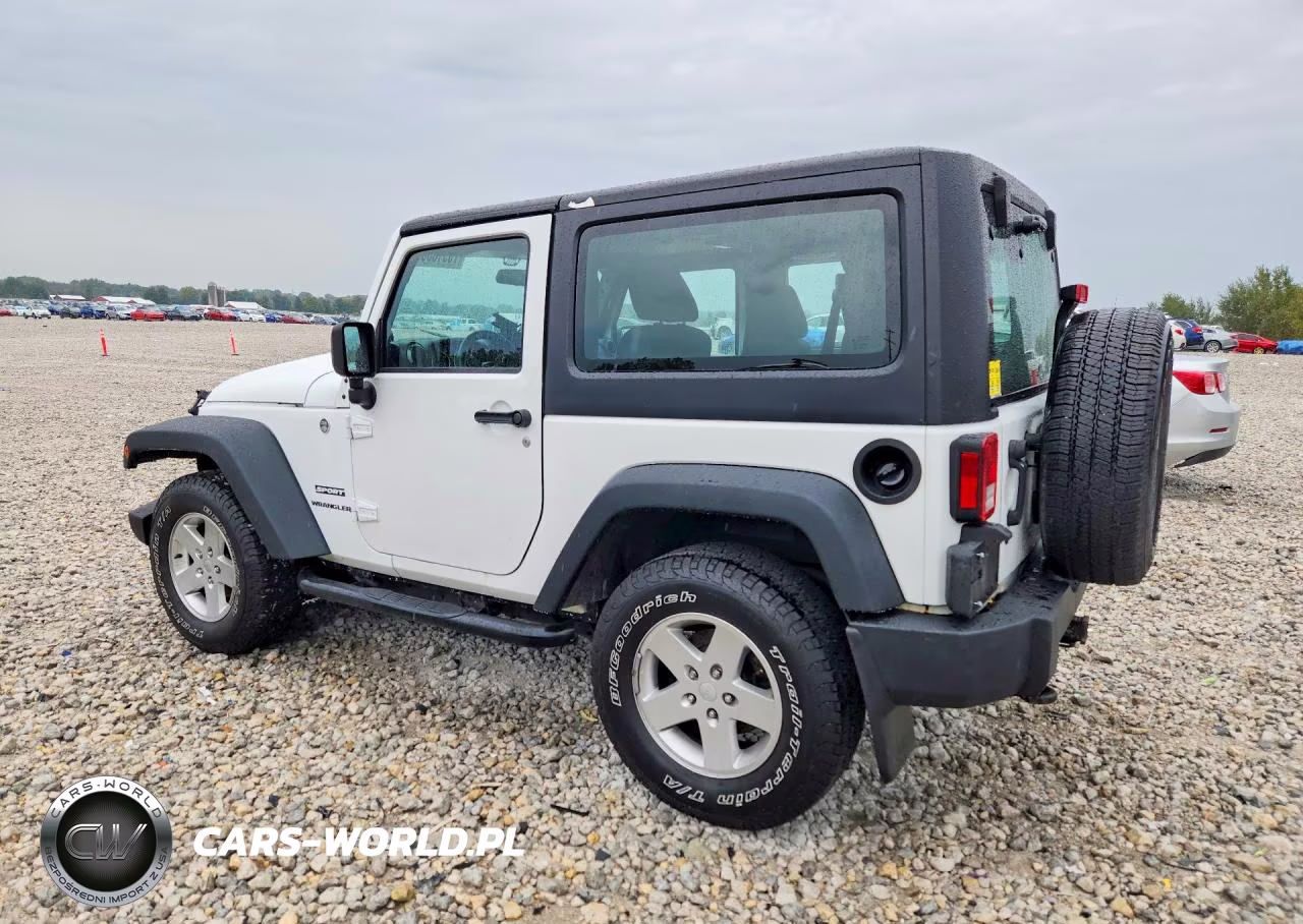 2012 Jeep Wrangler Sport VIN:1C4AJWAGXCL285048 - 2