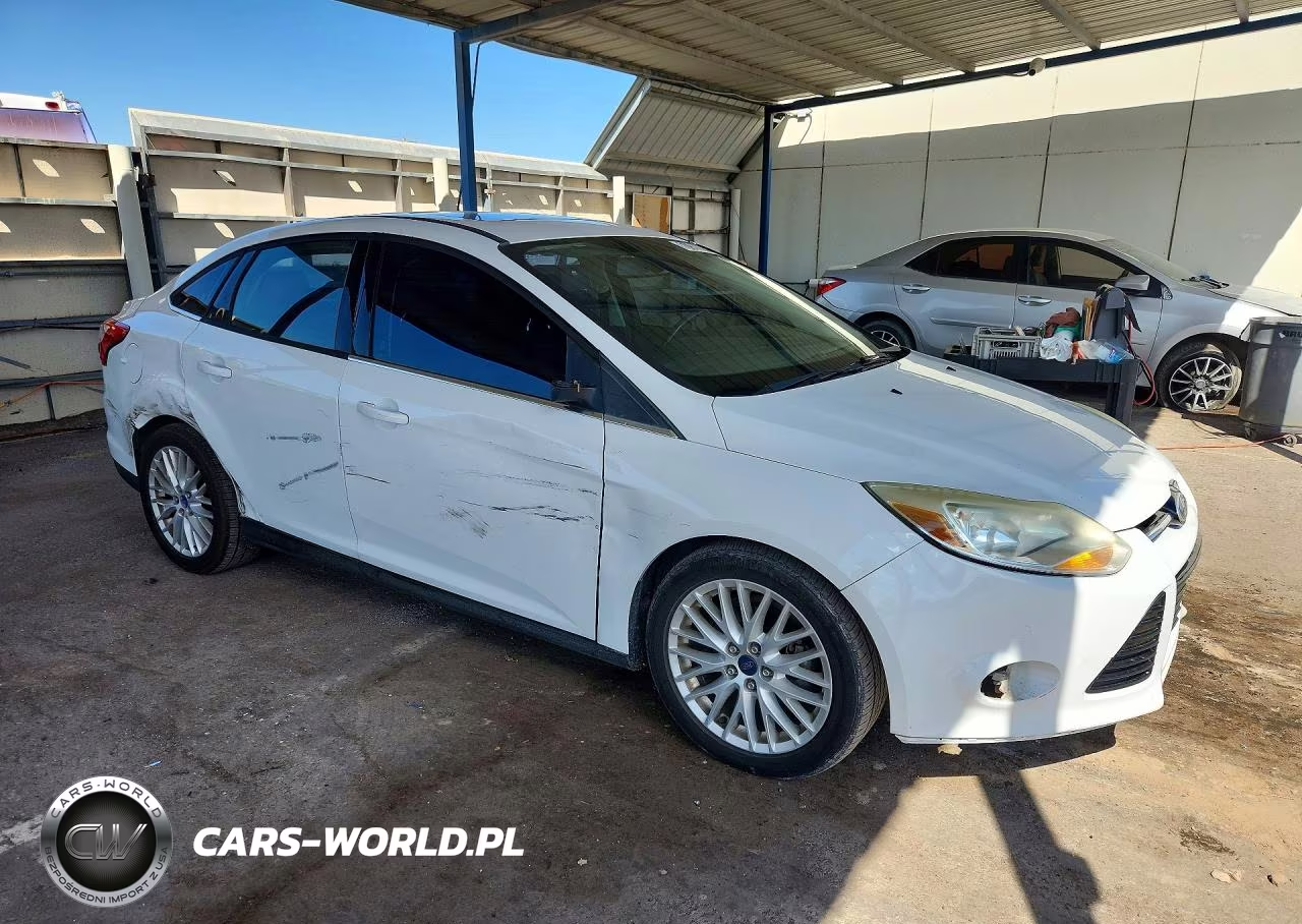 2012 Ford Focus Sel VIN:1FAHP3H22CL371577 - 4
